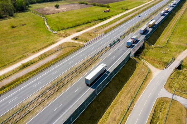 Aerial Follow Shot White Semi Truck Cargo Trailer Attached Moving Royalty Free Stock Images