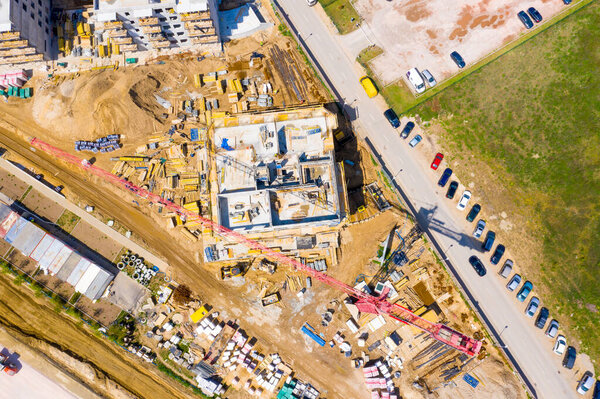 Construction site with cranes. Construction workers are building.Aerial view.Top view.