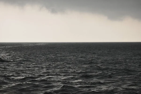 Storm on the Java sea. Indonesia. Heavy rain and overcast sky.