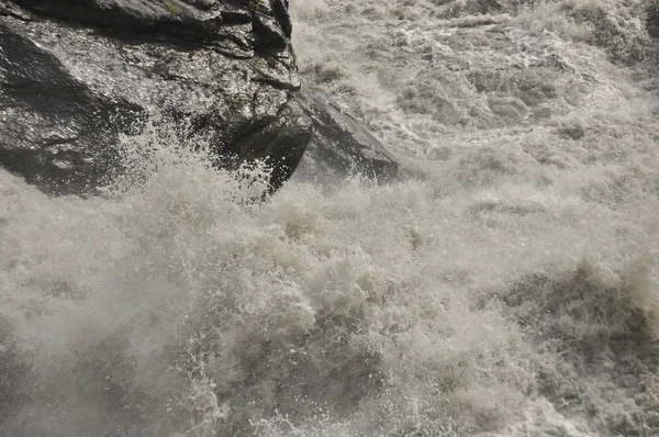 Inguri River. Georgia. Strong current and high level in the river.