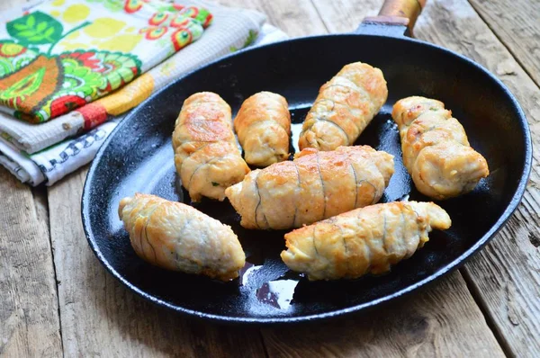 Fried chicken rolls in a frying pan — Stock Photo, Image