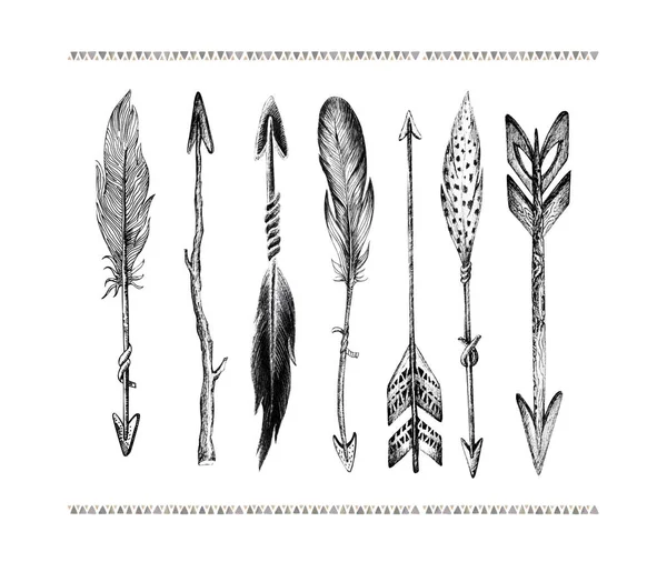 Set of hand drawn bird feathers isolated on white background. Bo