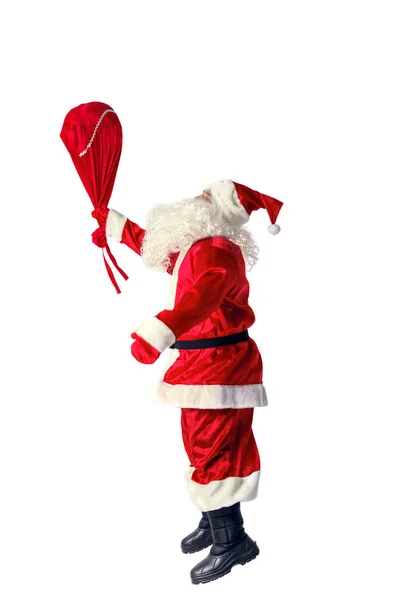 Radosny Santa Claus jumping i machając rękami. — Zdjęcie stockowe