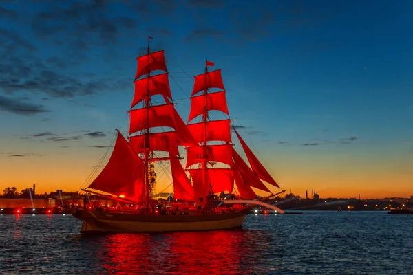 Ship with scarlet sails in the river Neva.