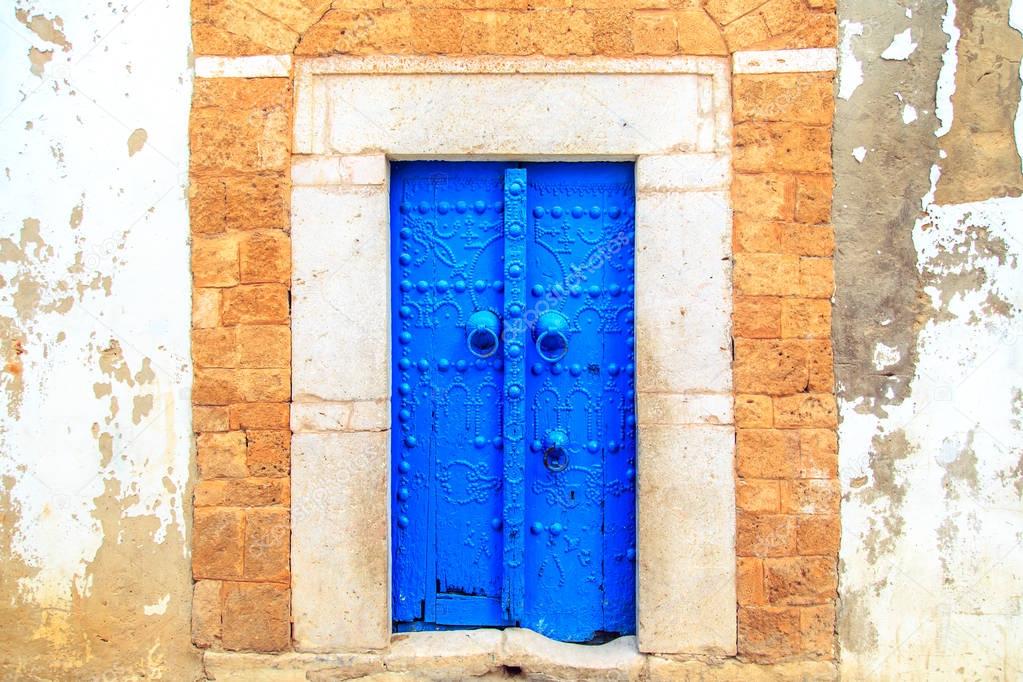 Traditional  door with ornament in Hammamet.
