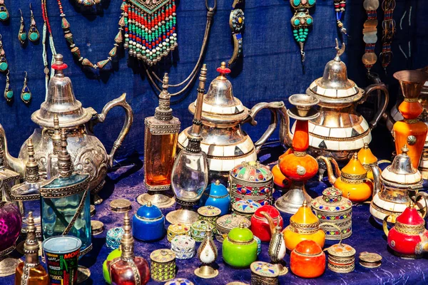 Colorful oriental dishes at a market in Marrakesh. Moroccan design. Oriental design, interior items.