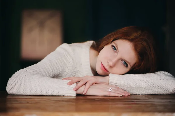 Close up indoor portrait of adorable thoughtful young redhead woman with freckles and long hair — Stock Photo, Image