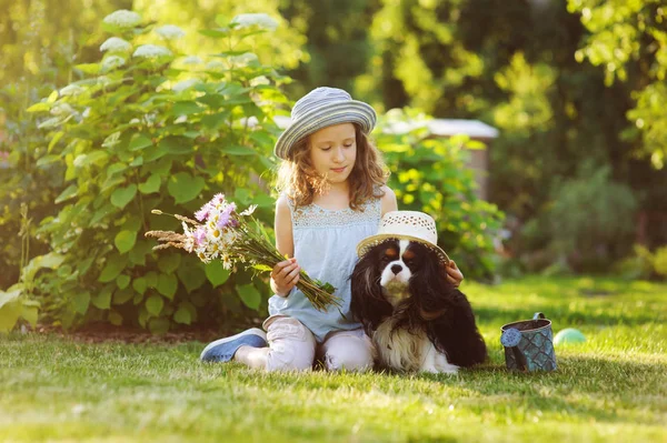 Child Girl Playing Her Spaniel Dog Summer Garden Both Wearing — Stock Photo, Image