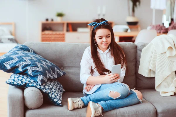 Happy Preteen Girl Relaxing Home Cozy Couch Listening Music Using — Stock Photo, Image