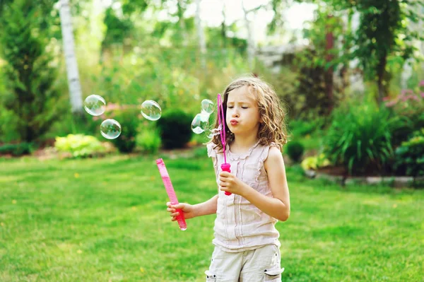 Happy Kid Girl Playing Soap Bubbles Summer Garden — Stock Photo, Image
