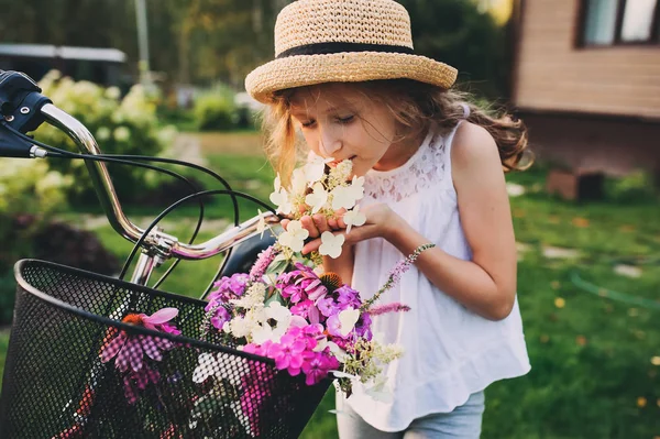 Happy Child Girl Hat Riding Bicycle Bouquet Wild Flowers Summer — Stock Photo, Image