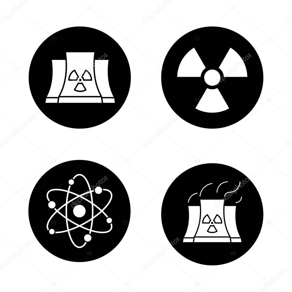 Atomic energy icons set. Nuclear power plant with smoke, radiation and atom symbols. Vector white silhouettes illustrations in black circles