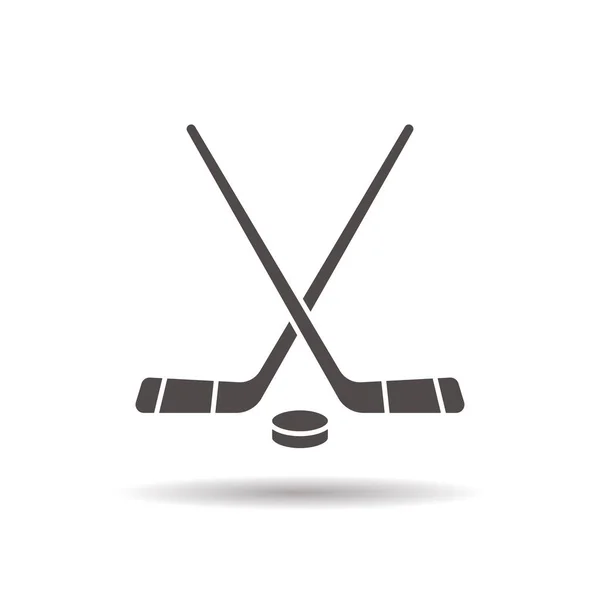 Download Two crossed ice hockey sticks and puck — Stock Vector ...