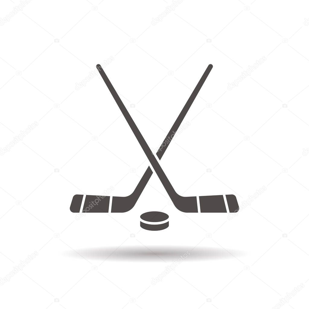 Hockey game equipment icon. Drop shadow silhouette symbol. Hockey sticks and puck. Negative space. Vector illustration