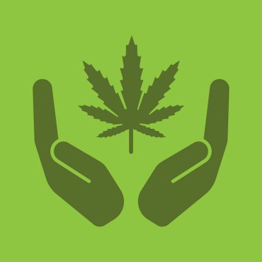Marihuana yaprağı simgesi olan açık avuç içi