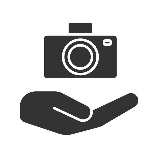 Open hand with camera icon — Stock Vector