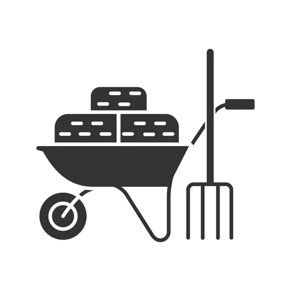 Wheelbarrow with bales of hay icon — Stock Vector