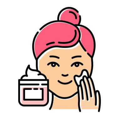 Krem rengi simgesi uygulanıyor. Deri bakımı prosedürü. Yüz güzelliği.