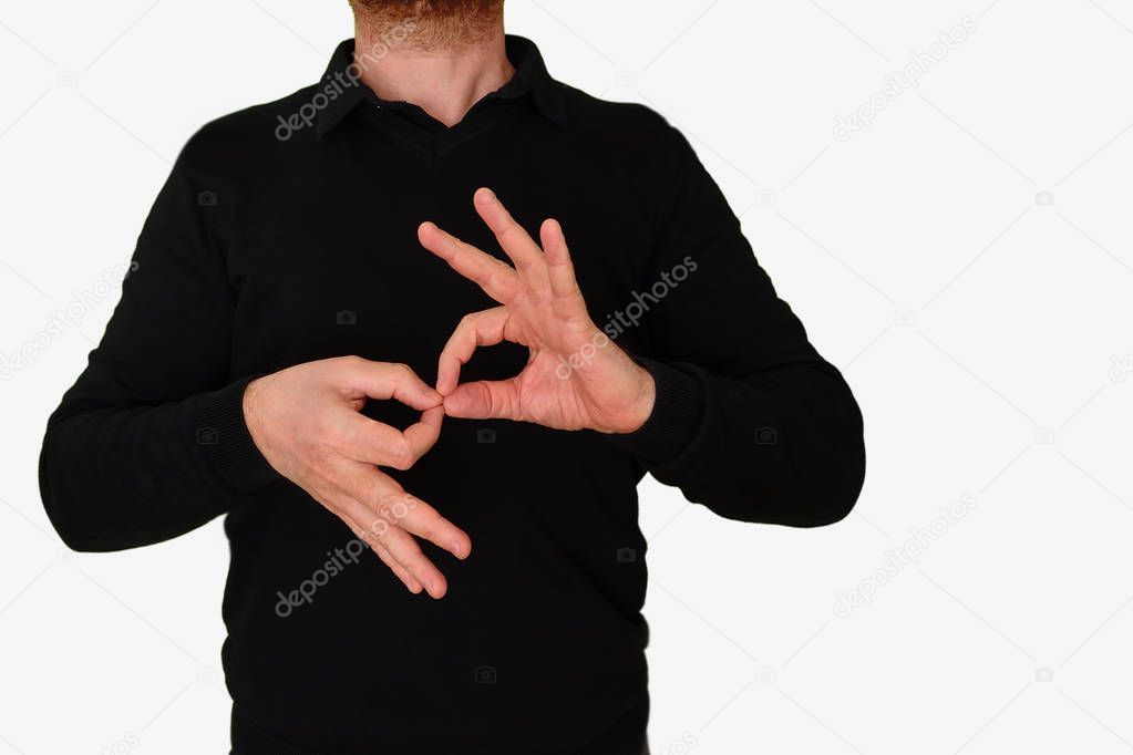 Sign language interpreter man translating a meeting to ASL, American Sign Language. Empty copy space