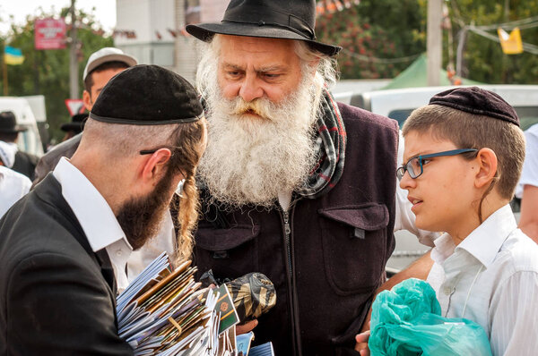 Uman, Ukraine - 2 October 2016: Rosh Hashanah, Jewish New Year 5777. It is celebrated at the grave of Rabbi Nachman. Pilgrims of Hasidim in traditional festive attire celebrate mass on the Uman.