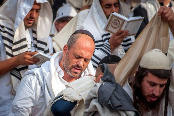 Prayer. Hasids pilgrims in traditional clothes. Uman, Ukraine - September 21, 2017: Rosh-ha-Shana festival, Jewish New Year.