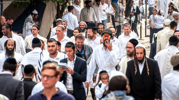 Hasids pilgrims in traditional clothes. Uman, Ukraine - September 21, 2017: Rosh hashanah holiday, Jewish New Year.