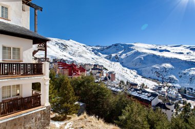 Mountain skiing - Pradollano, Sierra Nevada, Spain clipart