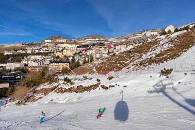 Mountain skiing - Pradollano, Sierra Nevada, Spain clipart