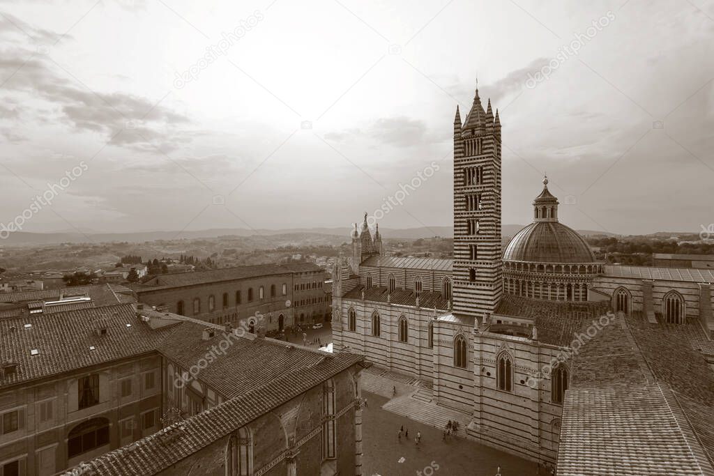 Siena Cathedral (Duomo di Siena) at sunset - Siena, Tuscany, Italy