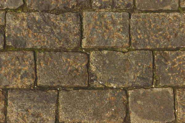Piedras antiguas de pavimentación marrón, fondo de piedra vintage, textura — Foto de Stock