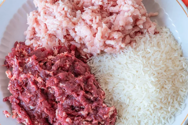Beef and pork mince, rice and vegetables for making Albondigas, Mexican soup with meatballs — Stock Image Beef Pork Mince Rice Vegetables Making Albondigas Mexican Soup Meatballs Stock Photo