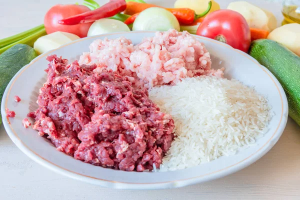 Beef and pork mince, rice and vegetables for making Albondigas, Mexican soup with meatballs — Stock Image Beef Pork Mince Rice Vegetables Making Albondigas Mexican Soup Meatballs Stock Picture