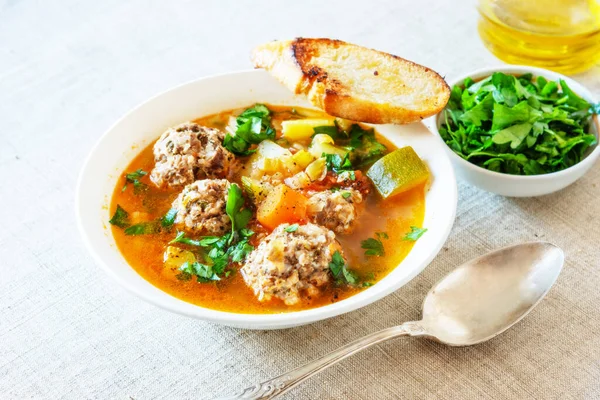 Mexican soup with meatballs and vegetables in a plate on a rustic background - Albondigas — Stock Image Mexican Soup Meatballs Vegetables Plate Rustic Background Albondigas Stock Photo