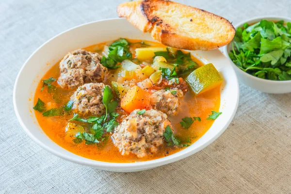 Mexican soup with meatballs and vegetables in a plate on a rustic background - Albondigas — Stock Image Mexican Soup Meatballs Vegetables Plate Rustic Background Albondigas Stock Photo