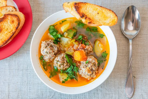 Mexican soup with meatballs and vegetables in a plate on a rustic background - Albondigas — Stock Image Mexican Soup Meatballs Vegetables Plate Rustic Background Albondigas Stock Image