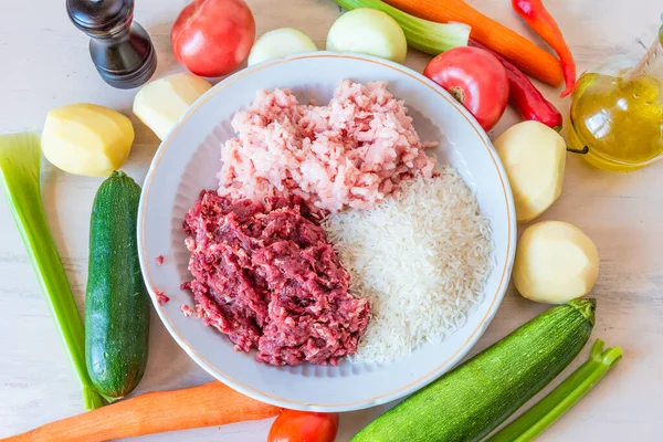 Beef and pork mince, rice and vegetables for making Albondigas, Mexican soup with meatballs — Stock Image Beef Pork Mince Rice Vegetables Making Albondigas Mexican Soup Meatballs Royalty Free Stock Images
