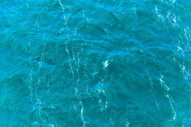 Deniz arka planı, su dokusu - küçük dalgalı su, üst görünüm