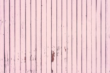 Pembe renge boyanmış eski tahtaların ahşap arka planı