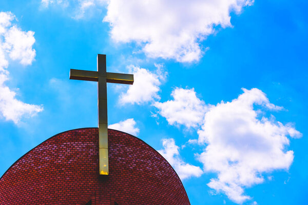 cross on the top of the church