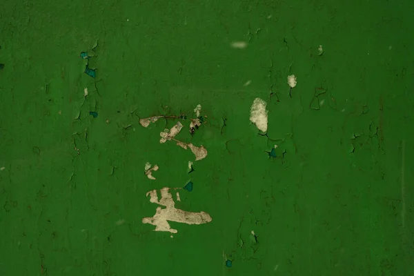 Retro background - wall with peeling green paint