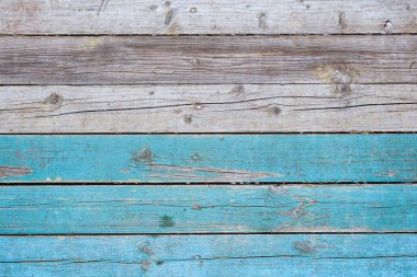 Ahşap kırsal arka plan - üzerinde mavi boya kalıntıları olan gri eski tahtalar