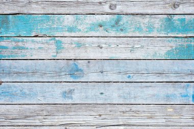 Ahşap kırsal arka plan - üzerinde mavi boya kalıntıları olan gri eski tahtalar