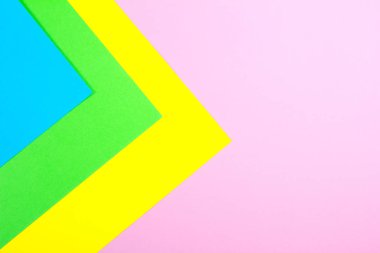 Malzeme tasarımına sarı, mavi, pembe ve yeşil arka plan kağıt. Fotoğraf.