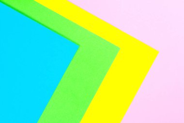 Malzeme tasarımına sarı, mavi, pembe ve yeşil arka plan kağıt. Fotoğraf.