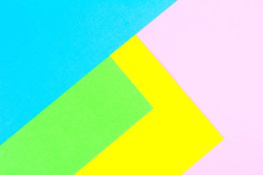 Malzeme tasarımına sarı, mavi, pembe ve yeşil arka plan kağıt. Fotoğraf.