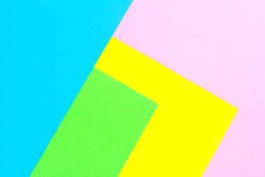 Malzeme tasarımına sarı, mavi, pembe ve yeşil arka plan kağıt. Fotoğraf.