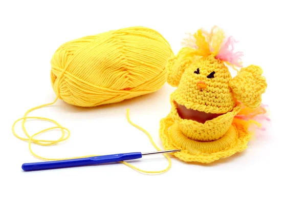 Yellow crochet chicken egg cup for Easter on white isolated back — Stock Photo, Image