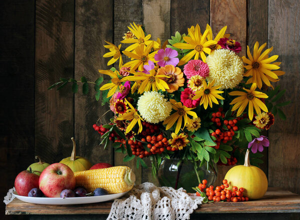 autumn still life with bouquet, fruit and vegetables