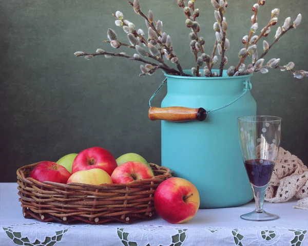 Still life with apples and branches of willow. Easter. — Stock Photo, Image
