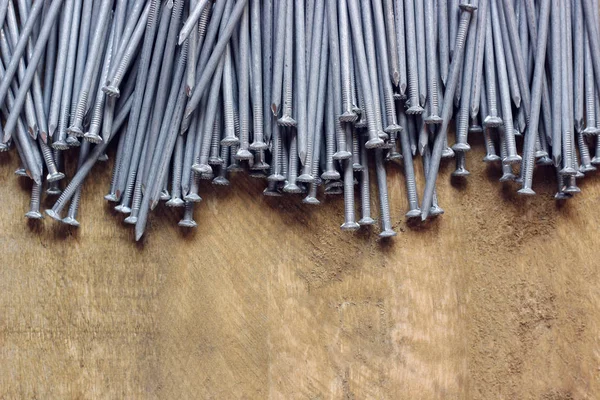 background of roofing nails, top view